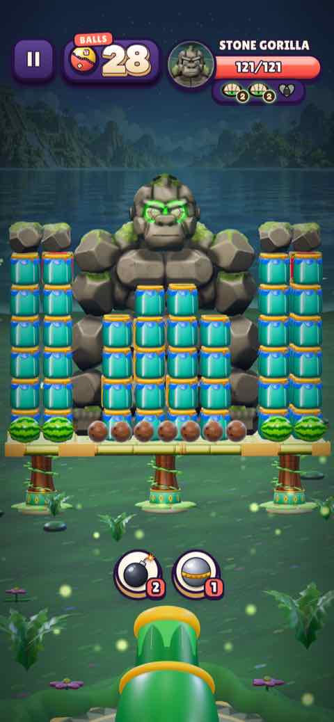 A boss level: the Stone Gorilla behind a wall of jars, the cannon at the bottom